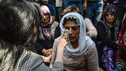 Mourners at a funeral for victims of the bombing of the wedding party in Gaziantep.