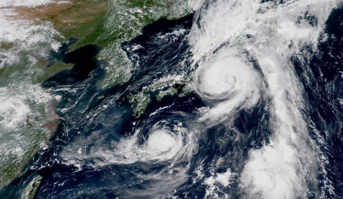 Typhoons Mindulle and Lionrock sit off the Japanese coast on Monday