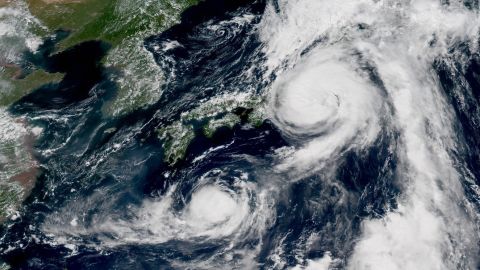Typhoons Mindulle and Lionrock sit off the Japanese coast on Monday