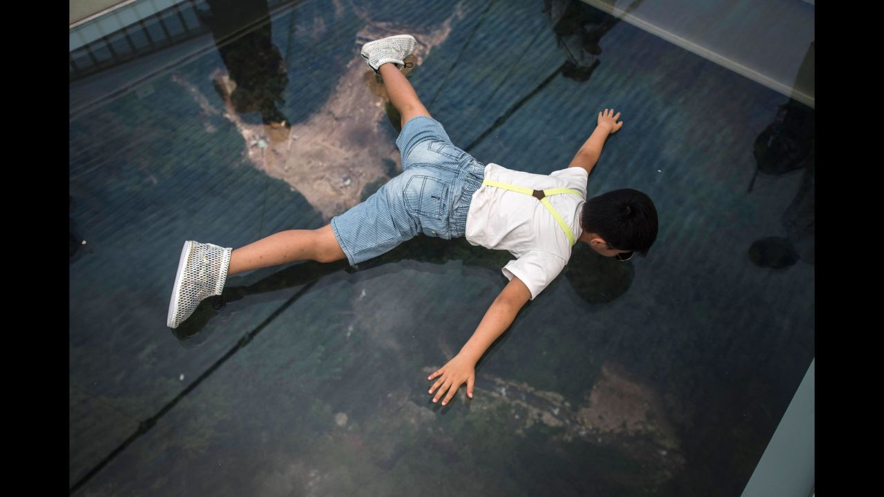 <strong>An unobstructed view: </strong>"Thanks to the glass-bottom walkway, visitors on the bridge can just look down and see someone bungee-jumping," says Joe Chen, deputy general manager of Zhangjiajie Grand Canyon Tourism Management.