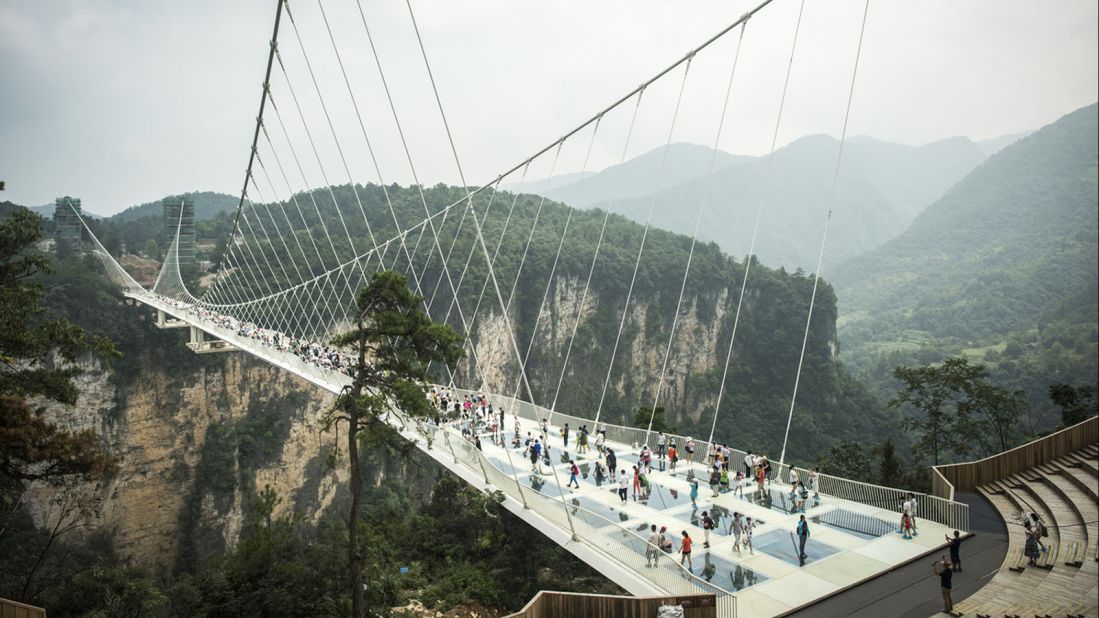 <strong>Tough structure: </strong>The Zhangjiajie bridge's creators claimed it set new levels for safety -- inviting journalists to attempt to smash the glass with a sledgehammer and even driving a car across it.