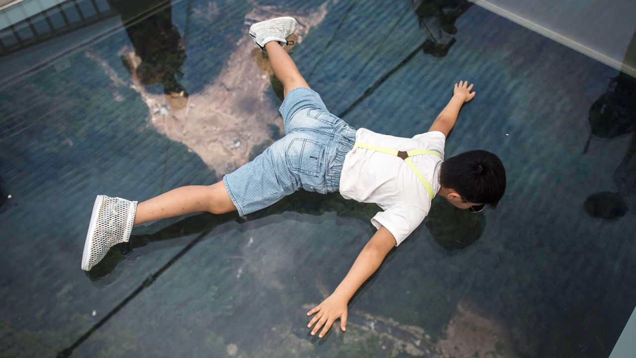 Don't look ... OK, do look down. The 430-meter-long bridge overlooks a stomach-churning 300-meter drop. 