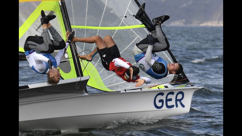 German sailors Erik Heil and Thomas Ploessel celebrate bronze in the 49er class.