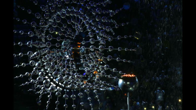 The Olympic flame is extinguished during the closing ceremony on Sunday, August 21.