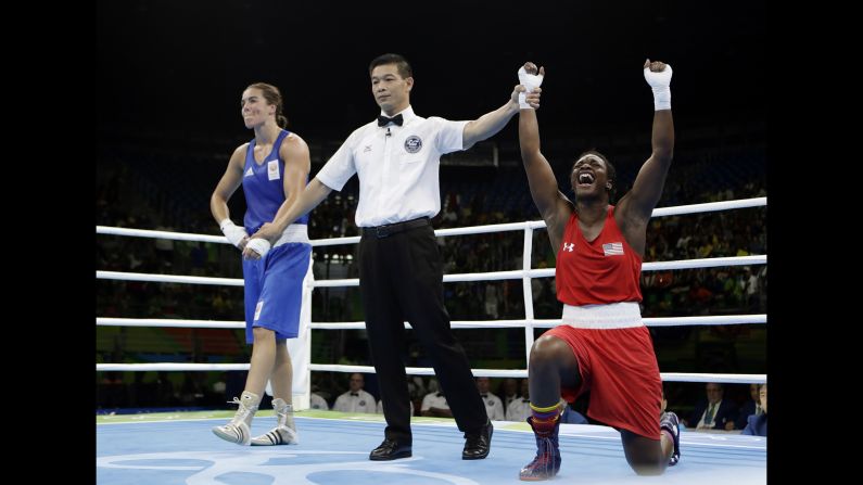 U.S. boxer Claressa Shields, right, reacts after winning gold in the middleweight final on Sunday, August 21. She also won gold in 2012.