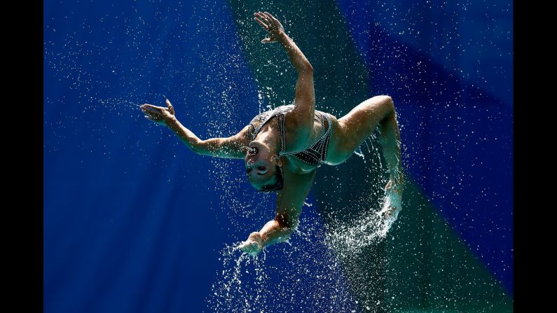 A synchronized swimmer from Russia takes part in the team's technical routine on Thursday, August 18. Russia won gold in both team and duet.