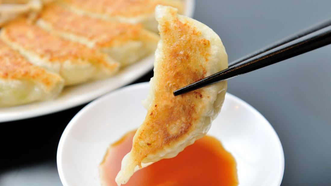 Bite-sized and rich, gyoza originated in China. It's normally filled with a mix of pork, cabbage and nira chives, then dipped into a tangy blend of soy sauce and vinegar. 