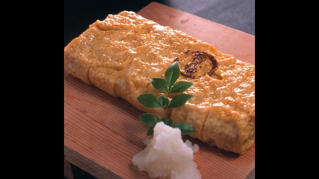 Tamagoyaki is made by rolling an egg mix -- with dashi -- into layers, then cutting into slices. 