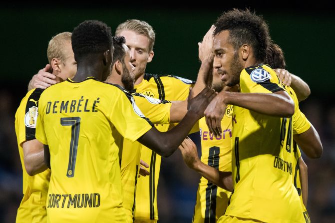 Back in the competition after spending last year in the Europa League, Dortmund will be one of the teams to fear. Its style of fast, free-flowing football has been one of the most exciting on the continent over the past year and, led by the likes of Marco Reus and top scorer Pierre-Emerick Aubameyang, it could reach the knockout stages.