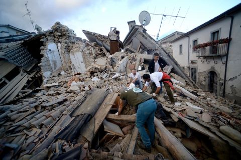 Residents search for victims in Amatrice.