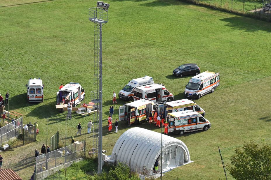 An emergency hospital camp is set up to treat earthquake victims in Arquata del Tronto.