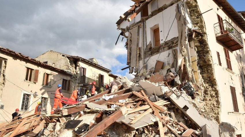 PERUGIA, ITALY - AUGUST 24:  Rescuers clear debris while searching for victims in damaged buildings on August 24, 2016 in Arquata del Tronto, Italy. Central Italy was struck by a powerful, 6.2-magnitude earthquake in the early hours, which has killed at least thirteen people and devastated dozens of mountain villages. Numerous buildings have collapsed in communities close to the epicenter of the quake near the town of Norcia in the region of Umbria, witnesses have told Italian media, with an increase in the death toll highly likely  (Photo by Giuseppe Bellini/Getty Images)