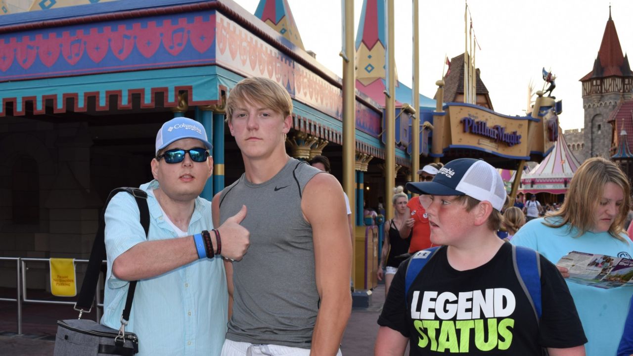 Firefighter and face transplant receipient Patrick Hardison at Disney World with his family.