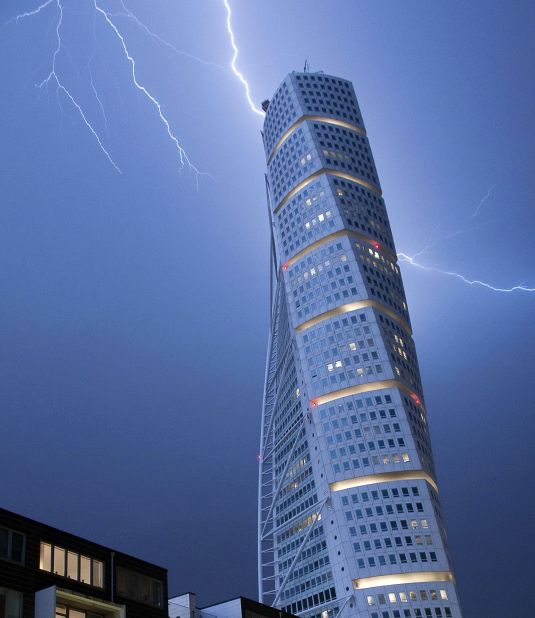 The world's first ever twisted tall building was the 190 meter (623 feet) Turning Torso, which was designed by Spanish architect Santiago Calatrava and completed in 2005. 