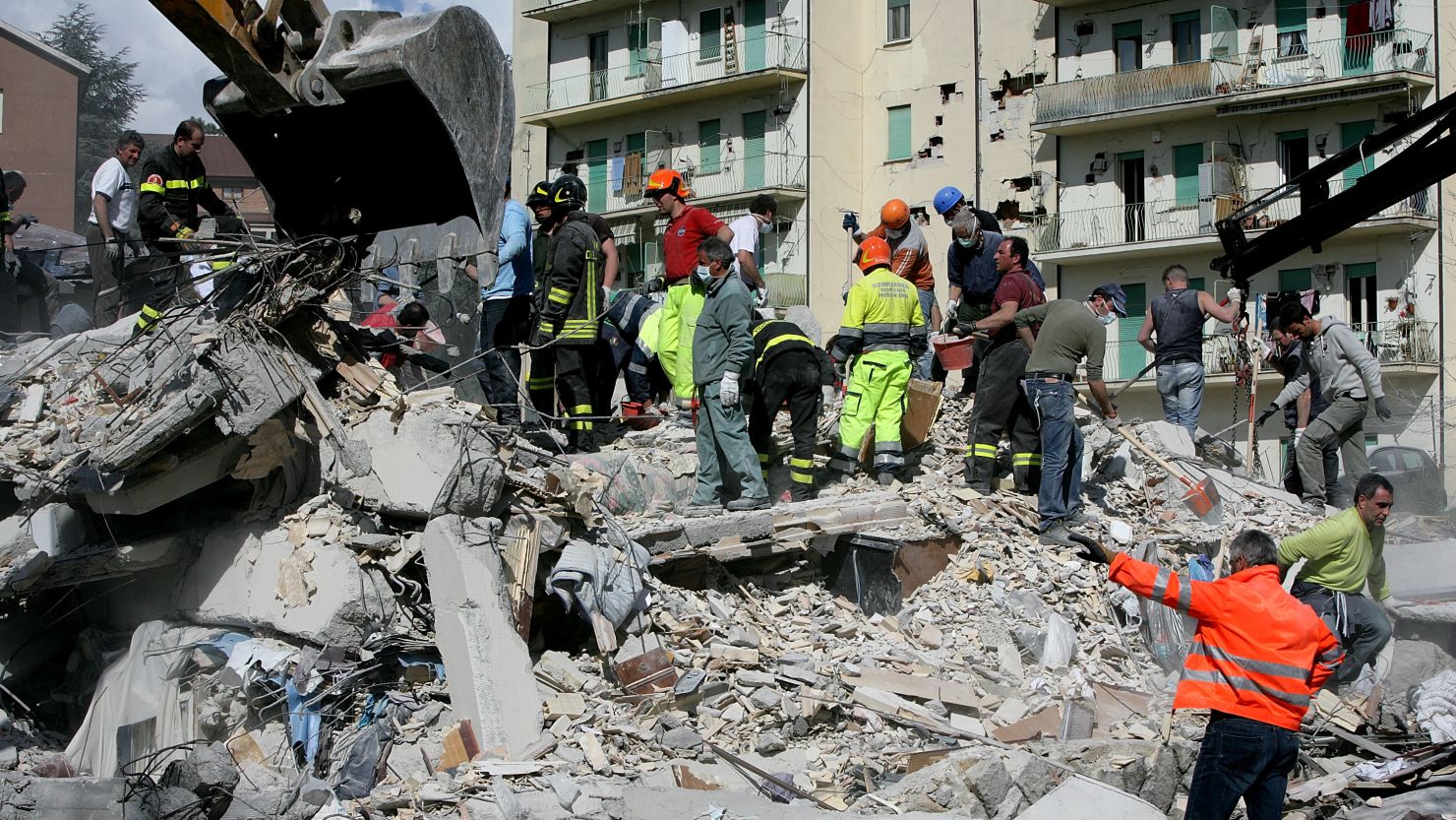 Rescue workers searched for bodies in the rubble of a destroyed building in L'Aquila, Italy, after a 6.3-magnitude earthquake tore through the region in April 2009. 