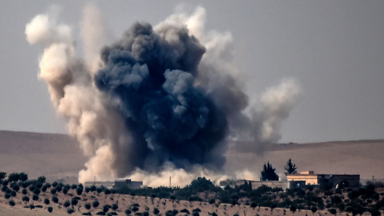 Smoke billows after a Turkish airstrike Wednesday on Jarablus, Syria.