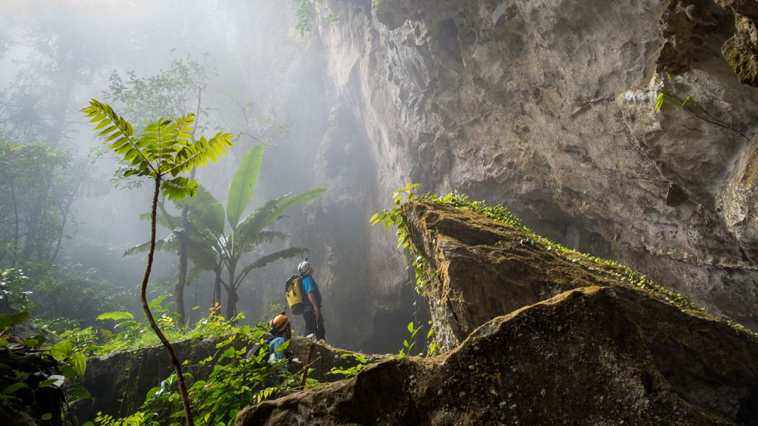 <strong>Entering the jungle: </strong>Hang Son Doong is so massive that it contains its own jungle, underground river and localized weather system. Clouds form inside the cave and spew out from the exits and dolines, which gave the first explorers a clue as to how large Hang Son Doong really is. 