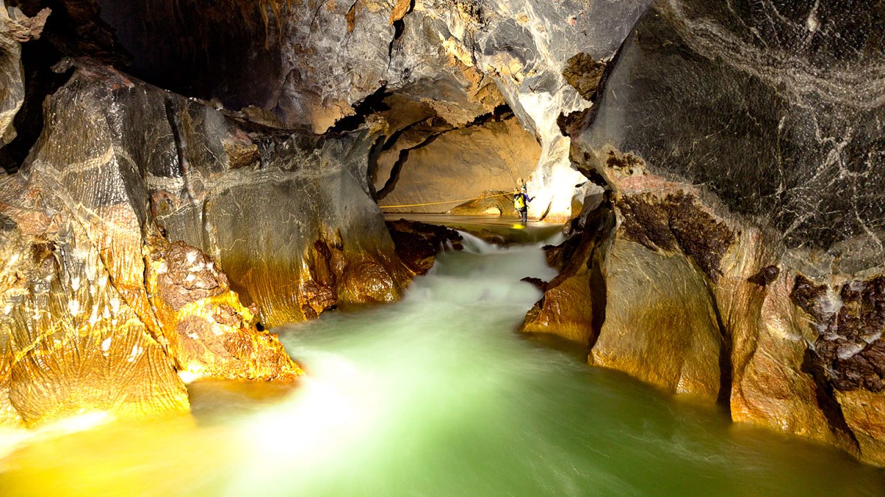 <strong>Rao Thuong River: </strong>The Rao Thuong River flows fast through the Son Doong cave system, continuously carving new chambers and passages. During the wet season the river floods to dizzying levels, halting any chance of exploration through the caves or jungle. 