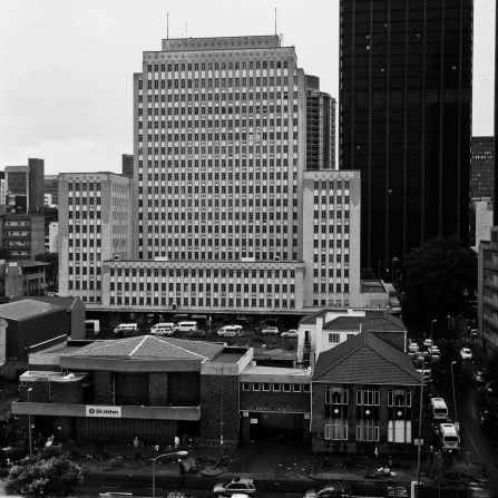 The 60-meter Eskom Centre was the tallest skyscraper in the city when it was completed in 1955 as the headquarters of the Electricity Supply Commission. <br /><br />The building still stands today but the company moved out over 20 years ago, declaring it inadequate for modern business needs. 