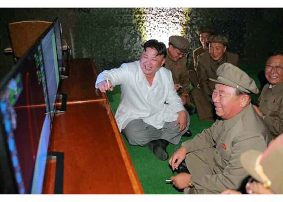 North Korean leader Kim Jong Un oversees the testing of a submarine launched ballistic missile test.