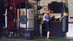 The family's garage gym grew bit by bit.