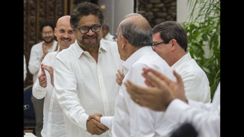 Ivan Marquez, left, shakes hands with Humberto de la Calle in Havana, Cuba, on Wednesday, August 24. Marquez, the commander of the Marxist rebel group FARC, and de la Calle, Colombia's chief negotiator, were together after <a href="http://www.cnn.com/2016/08/25/americas/colombia-farc-peace-deal-explainer/" target="_blank">reaching a final peace deal</a> in one of the world's longest-running conflicts.