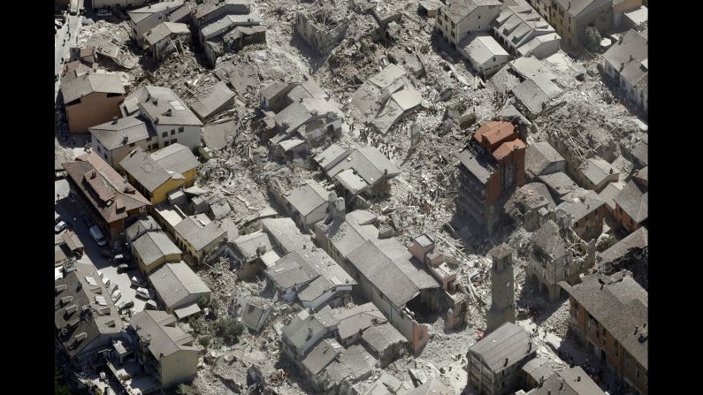 An aerial view of Amatrice, Italy, shows the devastation from a <a href="http://www.cnn.com/2016/08/24/europe/italy-earthquake-towns/" target="_blank">6.2-magnitude earthquake</a> on Wednesday, August 24. The earthquake struck just days ahead of the city's "Festival of the Spaghetti all'Amatriciana."