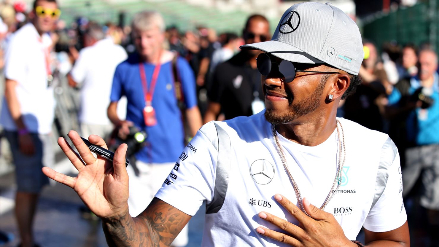 Lewis Hamilton waves to the fans at the Spa-Francorchamps circuit in Belgium.