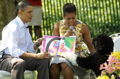 Obama and the first lady read to children with Bo during the White House Easter Egg Roll on the South Lawn of the White House on April 25, 2011.