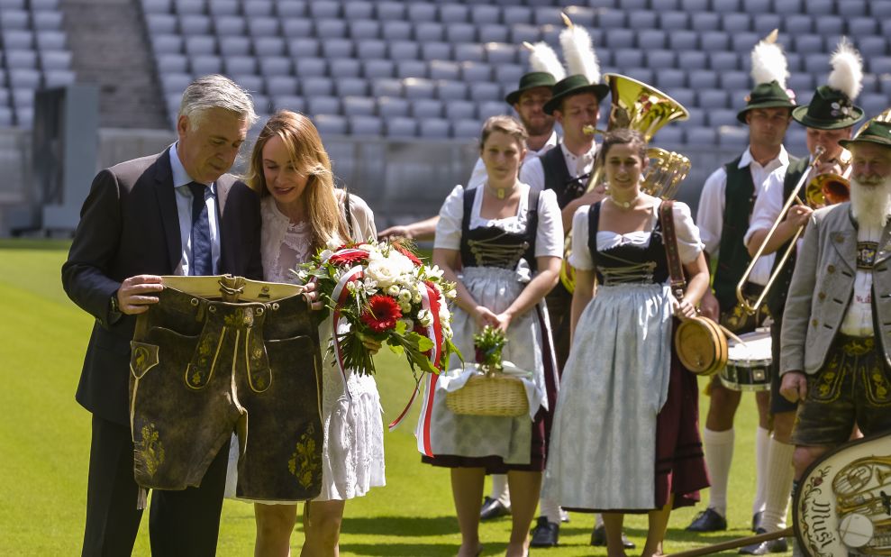After his dismissal in only his second year at Real, Ancelotti took a break from football spending a year in Canada with wife Mariann, who he marred in 2014. Here, the pair inspect the traditional Bavarian lederhosen which they received in July as the Italian started work in his latest role at the serial German champion, Bayern Munich. 