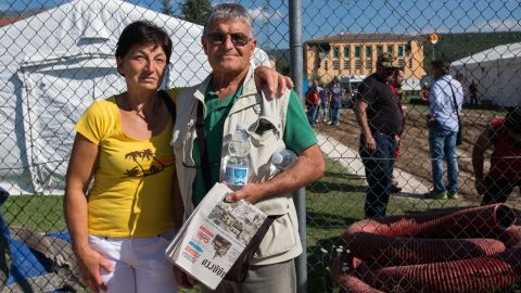 Marisa Di Tommaso and husband Michelo Giuseppe pose together near the makeshift headquarters of the Italian Red Cross in Amatrice.