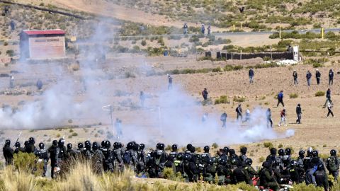 Riot policemen and miners clash in Panduro, Bolivia.