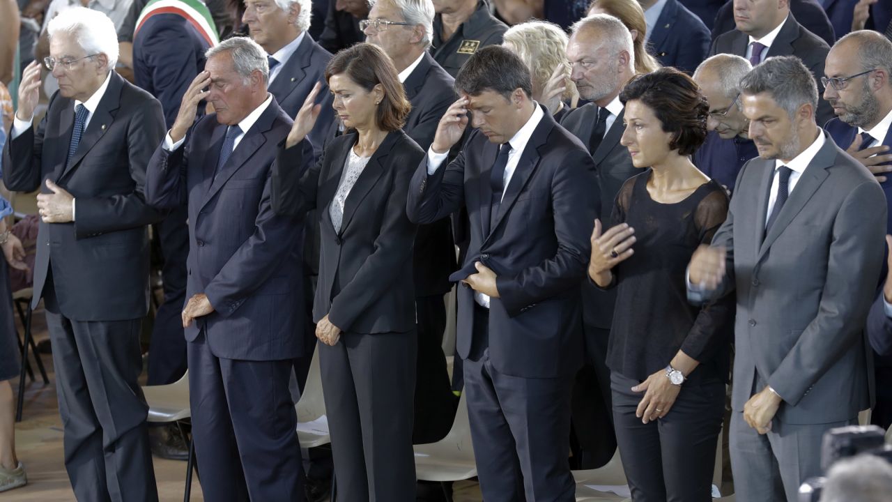 From left, Italian President Sergio Mattarella, Italian Senate President Pietro Grasso, Italian Lower Chamber President Laura Boldrini and Italian Prime Minister Matteo Renzi attend the funeral service.