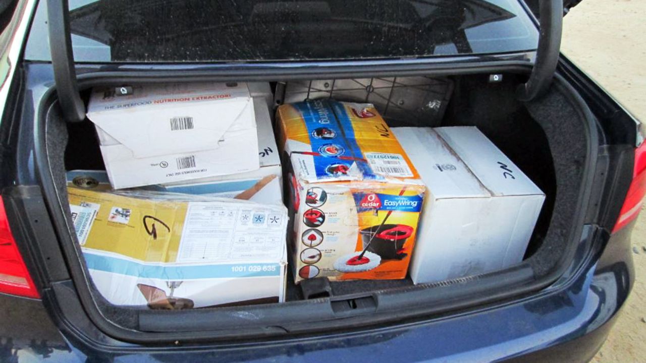 The U.S. Border Patrol photographed the boxes it says carried  $3 million in the trunk of a Volkswagen Passat 