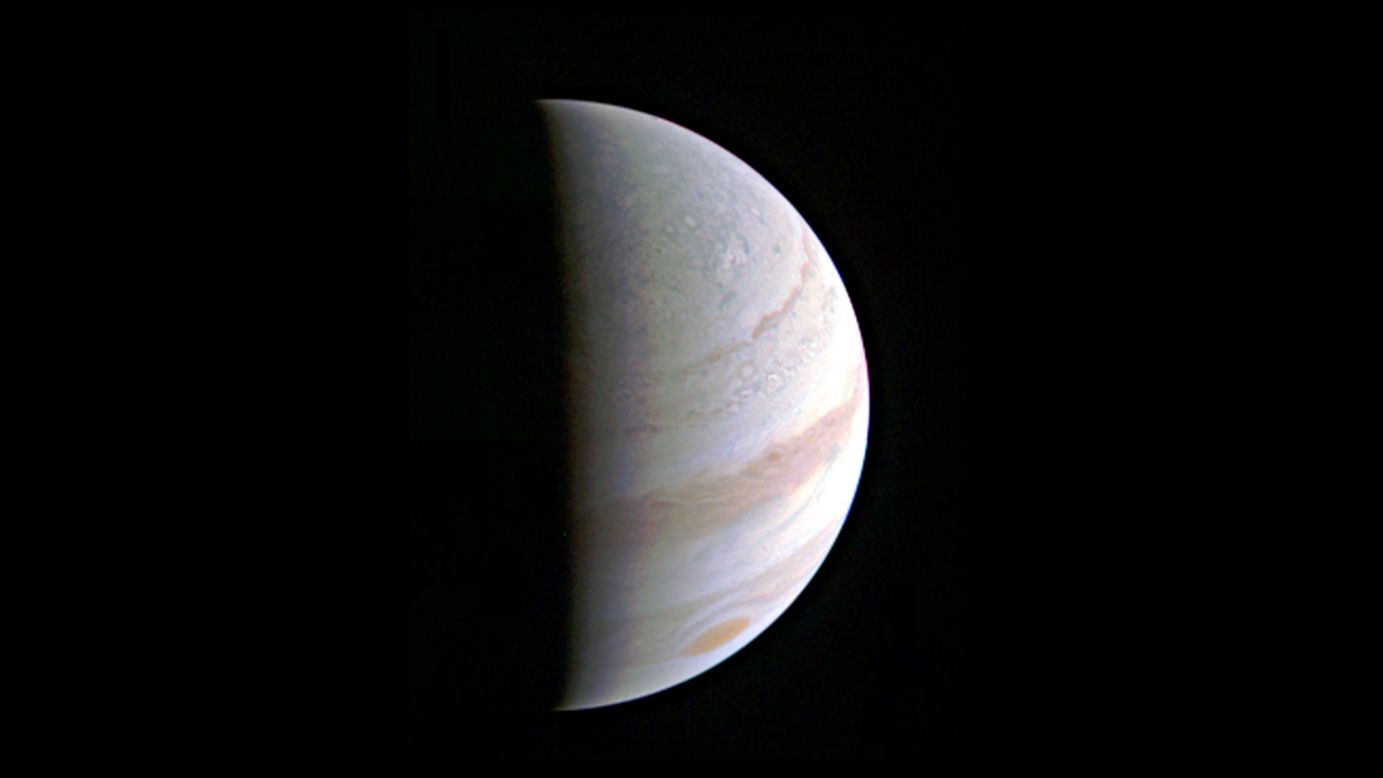 Jupiter's north polar region comes into view as NASA's Juno spacecraft approaches the giant planet. This view of Jupiter was taken when Juno was 437,000 miles (703,000 kilometers) away during its first of 36 orbital flybys of the planet. 