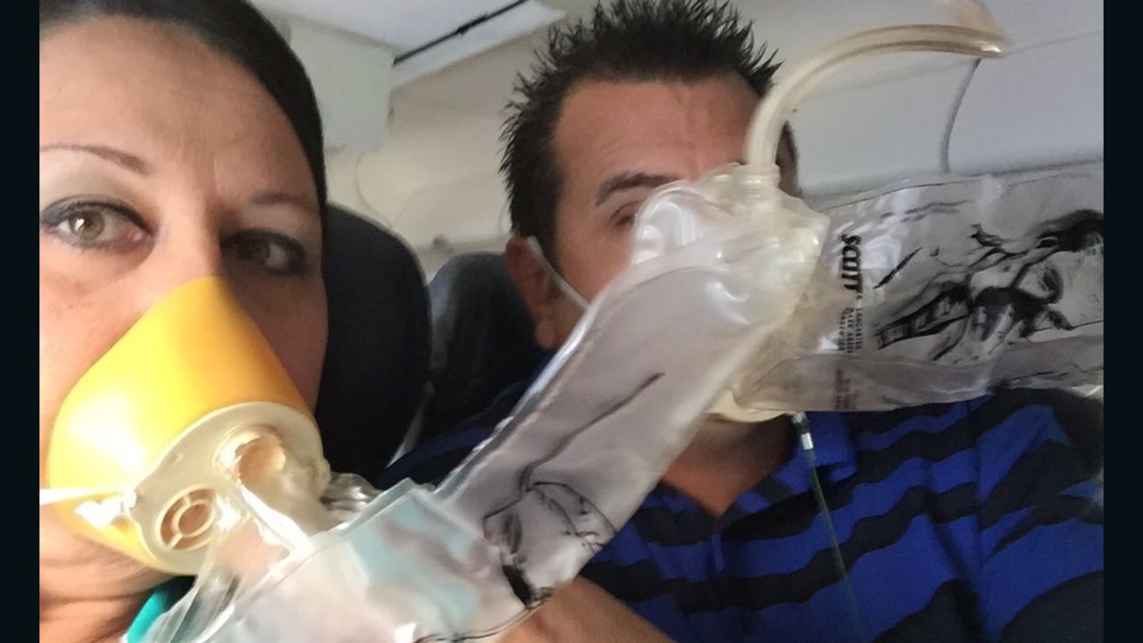 Passangers used oxygen masks as the airliner with 104 people aboard descended.