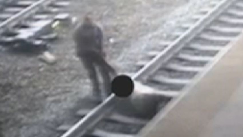 Officer Saves Man From Oncoming Train 2