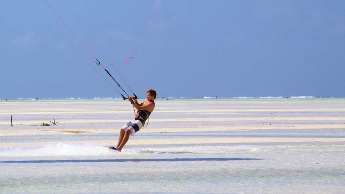 Shallow waters and steady winds make Paje, on Zanzibar's southeast coast, one of the best kite-surfing spots in the world. 
