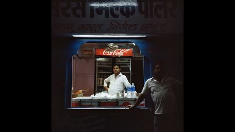 Ravi, a food vendor at the Kota Junction train station in Rajasthan, sells bottled water and fried Indian snacks to travelers. Food options vary by state, particularly from north to south, Hylton said.