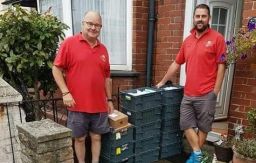 Postmen deliver crates full of birthday cards to Ollie's house in Exmouth. 