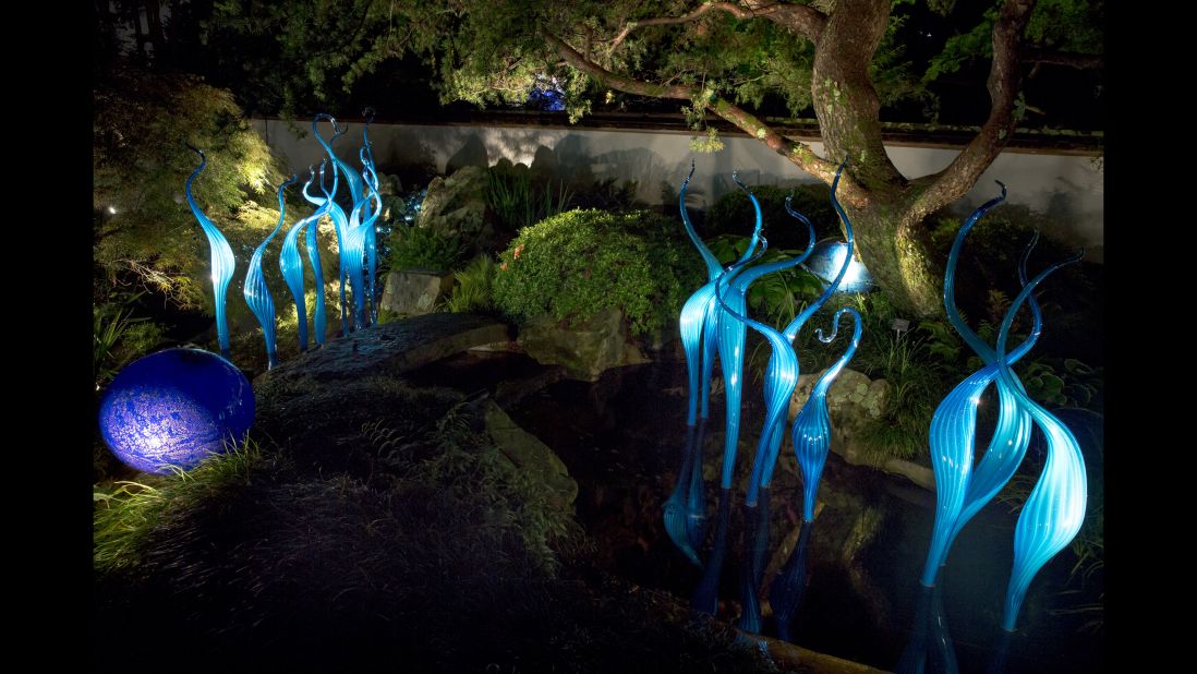 Tucked away in the Japanese Garden, "Turquoise Marlins and Floats" cast a nighttime spell in the walled area. 
