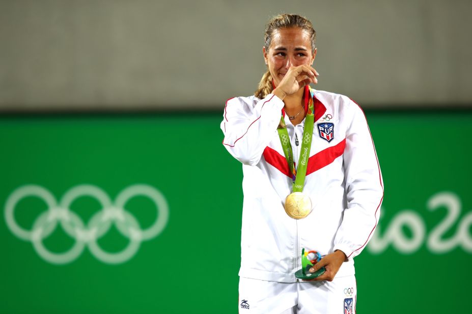 After seven decades of waiting, Puerto Rico's anthem -- "La Borinqueña" -- finally heralded an Olympic champion.  