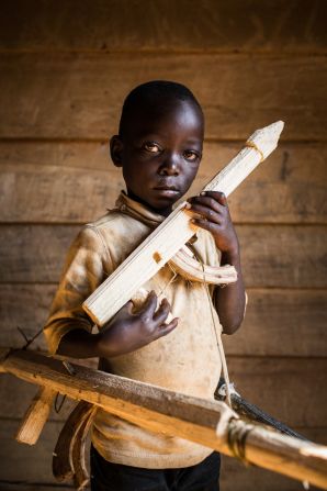 Paradoxe (Soldier), Democratic Republic of the Congo. "I don't know my exact age, and I don't go to school. One day I will be a soldier, to fight other soldiers. Soldiers are not kind because they killed my brother".?