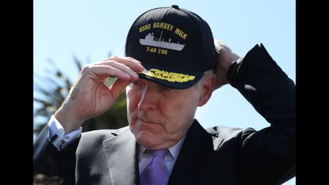 Former Navy Secretary Ray Mabus puts on a hat for the new USNS Harvey Milk during a ceremony on August 16, 2016.