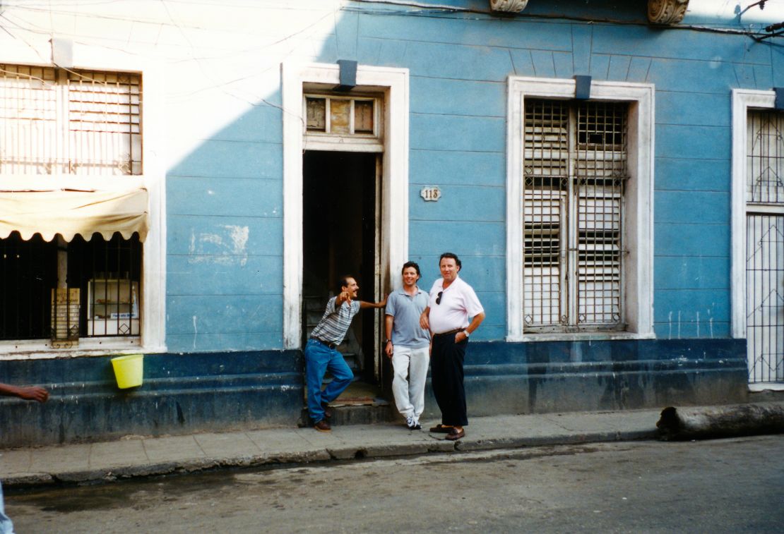 Then: Patrick Oppmann, center, his father and a Cuban resident in 1994.