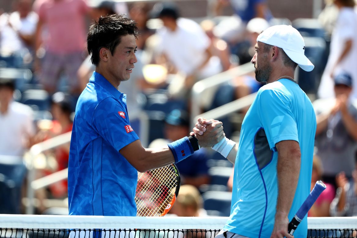 Japan's Kei Nishikori, seeded sixth, shakes hands with Benjamin Becker after beating the German 6-1 6-1 3-6 6-3 on Tuesday. 