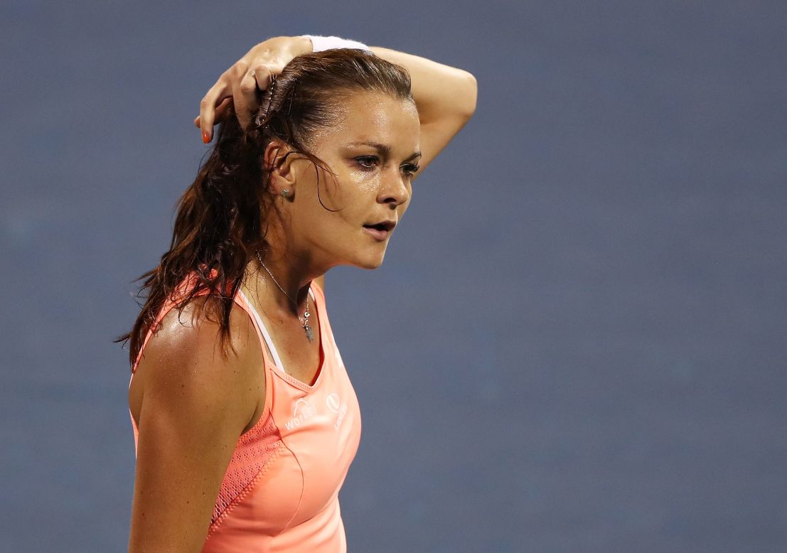 The players may have struggled in the searing heat -- temperatures were again tipping 30˚C on Tuesday -- but fourth seed Agnieszka Radwanska wasted little energy in her opening match brushing aside American Jessica Pegula 6-1 6-1.