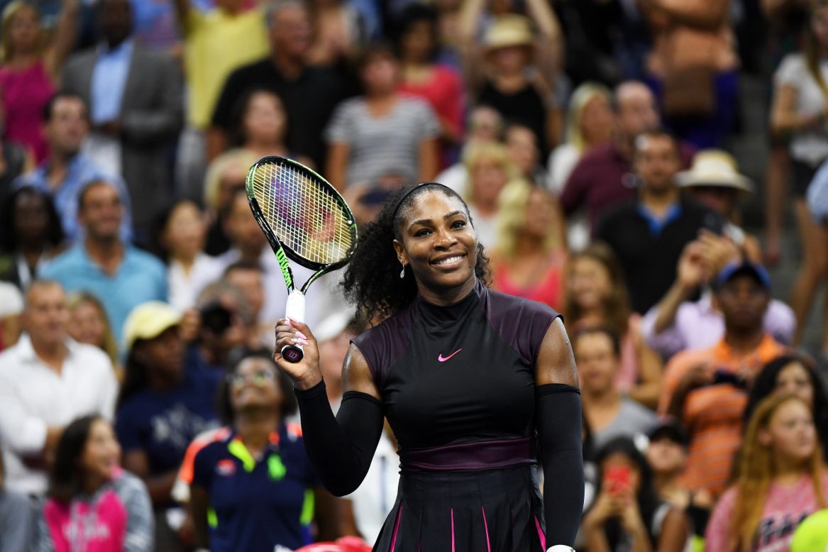 Serena Williams is all smiles after she beat Russia's Ekaterina Makarova 6-3 6-3 in their first round match. Williams is bidding for a record 23rd grand slam singles title.
