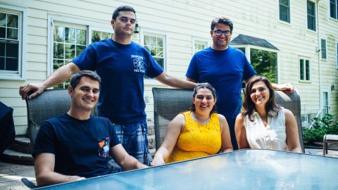 Five of the Palombo siblings sit on the patio of their New Jersey home. From left: Joe, Tommy, Maggie, Patrick and Maria.