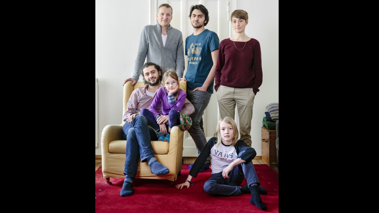Edgar and Amelie Rai and their children, Nelly and Moritz, welcomed Syrian brothers, Bilal (seated) and Amr Aljaber.